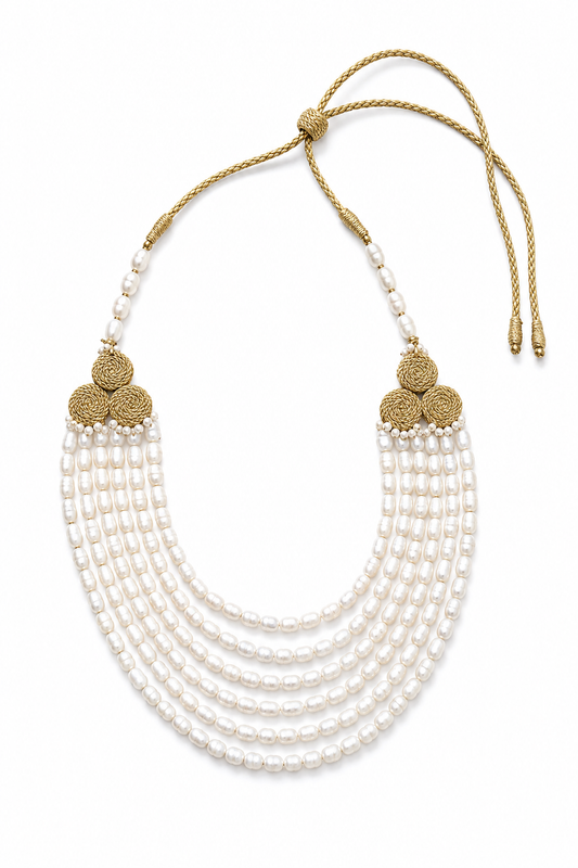 “Atlas Pearl Collar handcrafted in Morocco with layered freshwater pearls and woven metallic cord rosette connectors.”